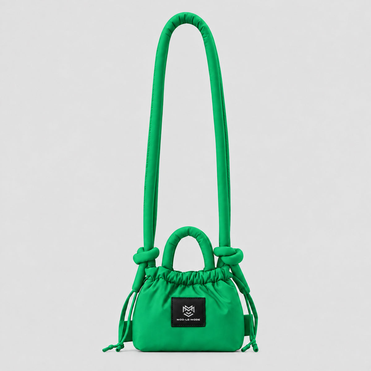 Green MOD-LE-MODE PUFFER Mini multiway convertible tote bag with drawstring closure, adjustable shoulder strap and front logo patch, photographed in a studio.