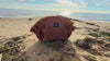 MOD-LE-MODE OYSTER lay-flat tote bag on a beach with waves coming in